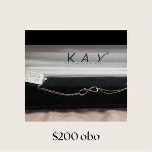 Kay Jewelers Infinity Bracelet in Silver with Rose Accent